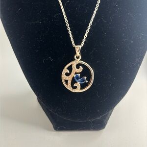 Elegant Gold Necklace with Blue Pendant